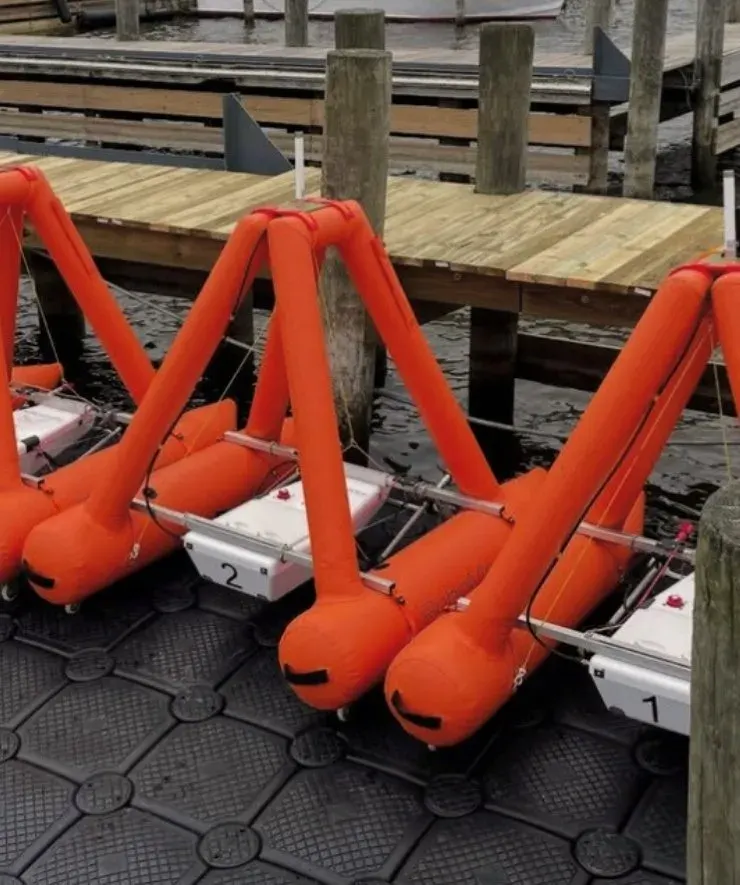 A fleet of RoboMarks stored on a wooden pontoon