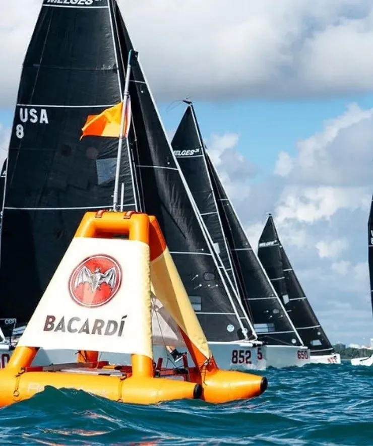 A fleet starts beside a RoboMark at the Bacardi Cup